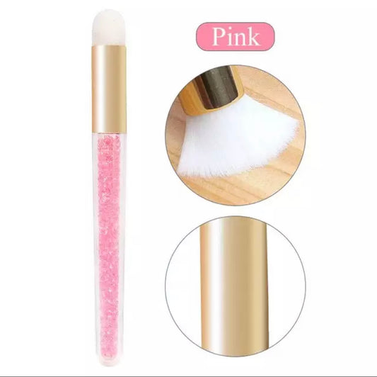 pink brush to clean lashes